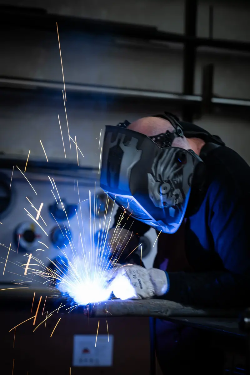 Welding — sparks and blue arc